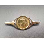 22K Yellow Gold Half Sovereign in a 9K Yellow Gold Brooch Setting. 6.2g total weight.