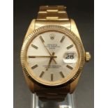 Rolex Oyster Perpetual Date watch 18k yellow gold face and solid gold strap, 34mm