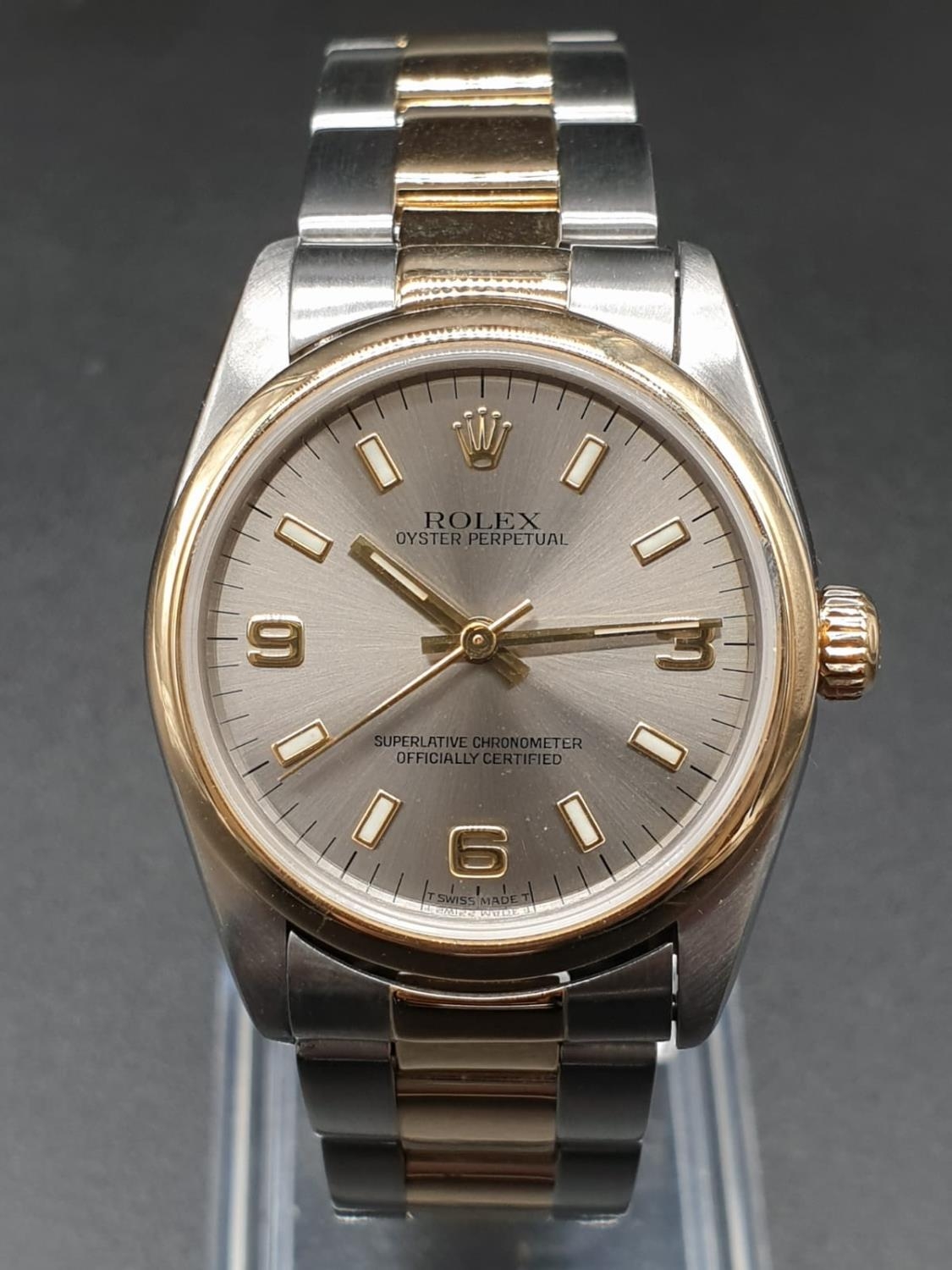 Rolex Oyster Perpetual unisex watch, two-tone colours silver face. 32mm