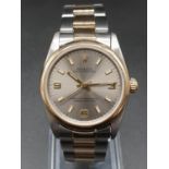 Rolex Oyster Perpetual unisex watch, two-tone colours silver face. 32mm