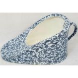 A blue and white porcelain NEW SLIPPER BED PAN by Maw Son & Thomson London. This was the luxury