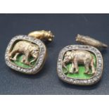 A PAIR OF SILVER WITH ENAMEL AND DIAMOND RUSSIAN CUFFLINKS DEPICTING AN ELEPHANT AND BEAR