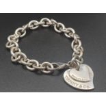 Silver Bracelet with Two Tiffany Heart Charms. 18cm. 31g total weight.