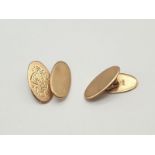 A Pair of 9K Yellow Gold Oval Cufflinks. 7.2g