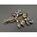 9K Yellow Gold Topaz and Pearl flower brooch. Weighs 6.7g.