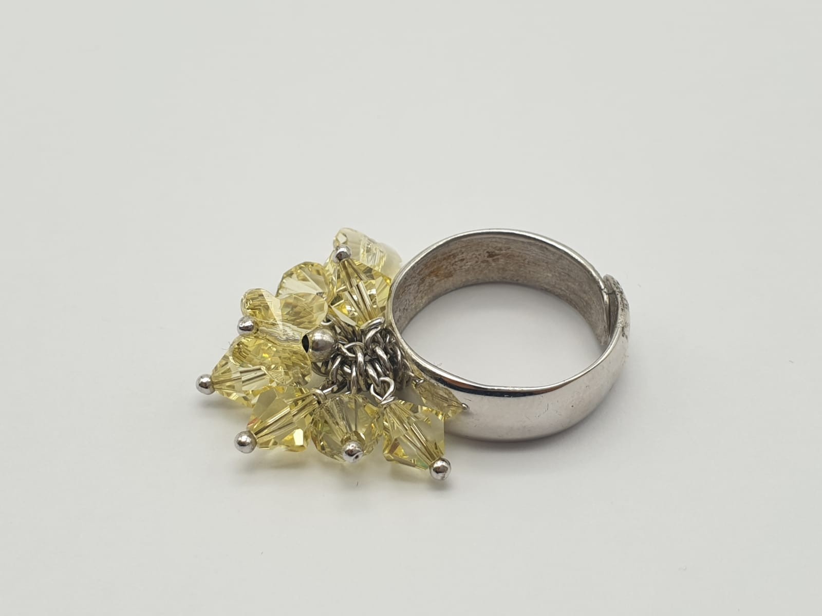 A Silver Ring with Multiple Miniature Yellow-Stone Attachments. Size P (expandable). 7.43g - Image 3 of 6