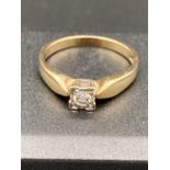 Ladies 9 carat GOLD and DIAMOND ring ,having SOLITAIRE in square set mount to top .full UK