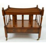 Regency Style Mahogany Magazine Stand. Single lower opening drawer and raised on brass castor