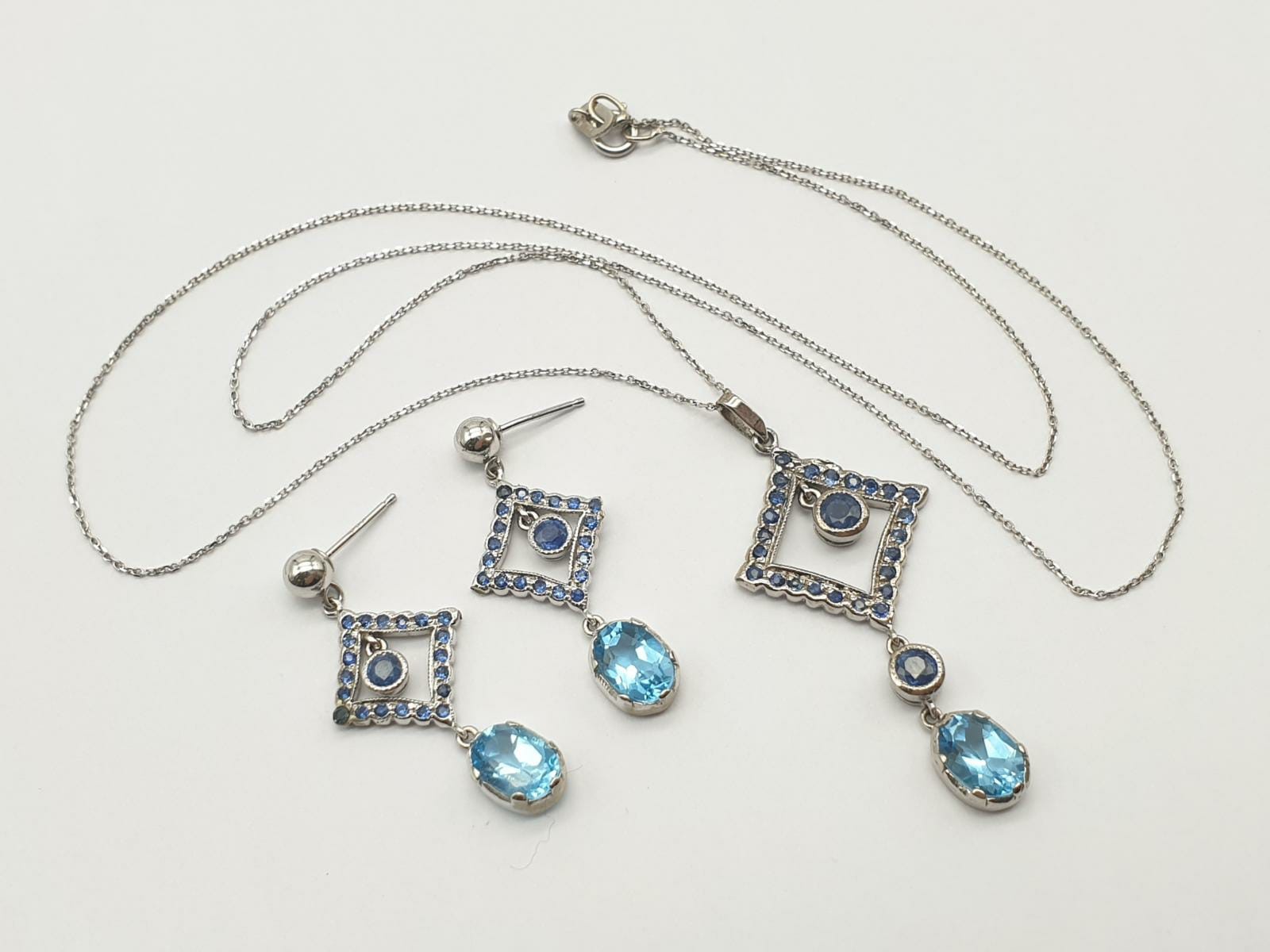 Set of 14K White Gold Sapphire Drop Earrings and Necklace. Multiple Sapphires on each piece. 46cm