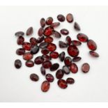 50 Oval cut Garnets. Total carat weight 7.05g.