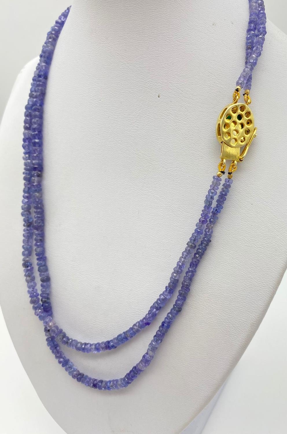 200cts Two-Row Tanzanite Gemstone Necklace with Emerald clasp circled with a halo of diamonds. 46cm - Image 3 of 3