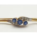 An 18K Yellow Gold Diamond and Sapphire Brooch. 5.5cm. 3.83g