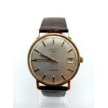 A VINTAGE 9K GOLD ROTARY GENTS WRIST WATCH ON A LEATHER STRAP, MANUAL MOVEMENT