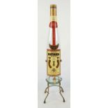 A Five Star METAXA brandy bottle (empty) of large proportions with tap and metal base. Total height: