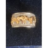 Silver Tova ring having gold elephants to top with Diamonique surround. Size M.