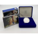 The Royal Mint Golden Jubilee Silver Celebratory Coin. 1952 - 2002. Comes in presentation box. 28.2g
