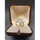 AN 18K GOLD SEVEN DIAMOND CLUSTER RING WITH TOP QUALITY DIAMONDS. 3.9gms size p