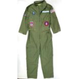 US Airforce flight suit with full badges including the United States Fighter Weapons School Top Gun.