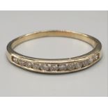 14K Yellow Gold Diamond half eternity ring, 0.20ct. Weighs 1.3g. Size O.
