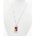 A Silver and Enamel Pendant Necklace. 64cm. 8.66g