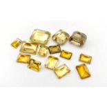 14 Rectangle Cut Citrines. Total carat weight 73.g.