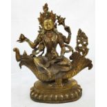 A VERY EARLY ORIENTAL GILDED BRONZE STATUE OF AN ASIAN GODDESS. 1.7kg 27cms in height.