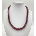 399cts Faceted Ruby Necklace with Emerald Clasp. 42cm