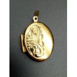 9CT GOLD OVAL PATTERENED LOCKET 4.2G