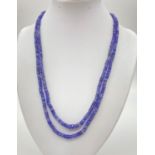 200cts Two-Row Tanzanite Gemstone Necklace with Emerald clasp circled with a halo of diamonds. 46cm