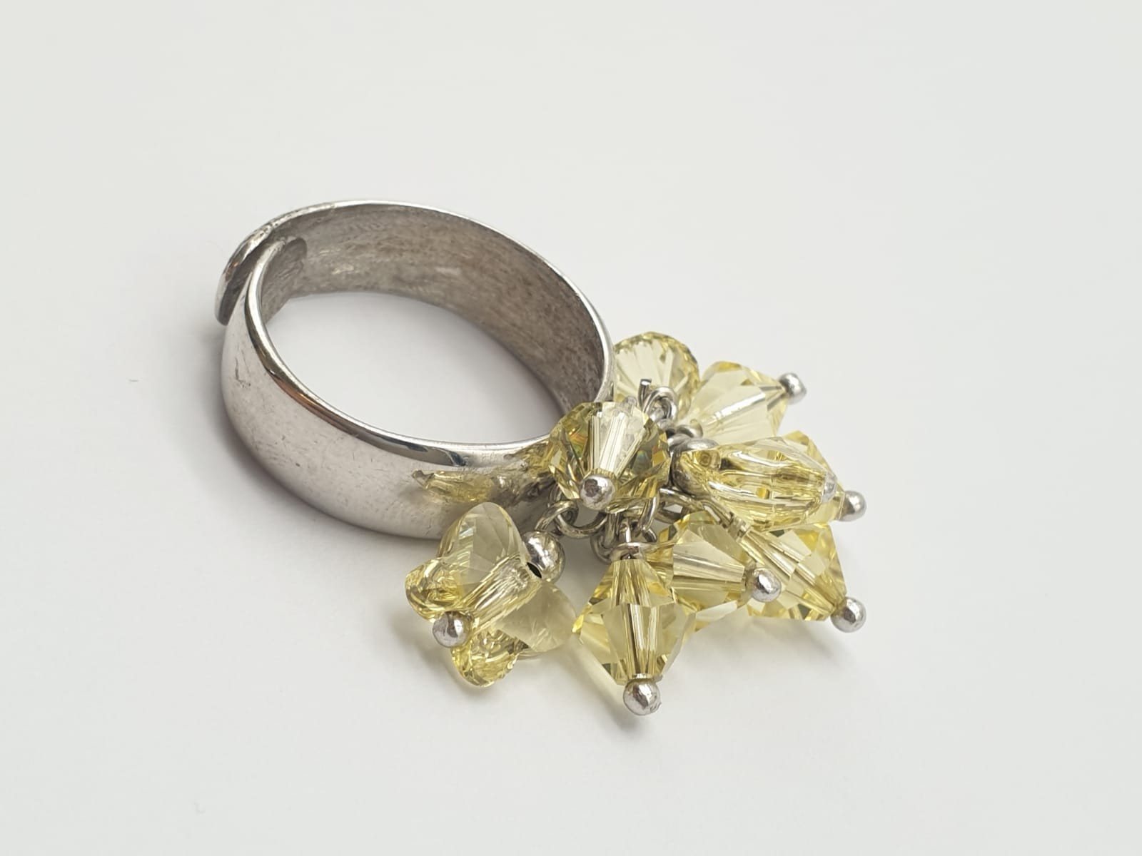 A Silver Ring with Multiple Miniature Yellow-Stone Attachments. Size P (expandable). 7.43g - Image 6 of 6