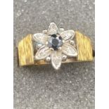 18 Carat gold SAPPHIRE and DIAMOND RING. 5.3 grams .Size L-M.