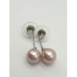 A Pair of 9k White Gold Diamond and Pink Pearl Drop Earrings.