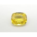 A very attractive, oval cushion cut, yellow sapphire from Sri Lanka. Weight: 12.05 carats.