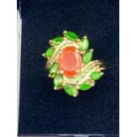 Ladies 9 CARAT GOLD gem set ring having green tourmaline and orange stones to top. 4.3 grams .Size