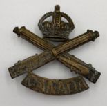 WW1 Canadian Machine Gun Corps Cap Badge. Maker: J.R.Gaunt London.