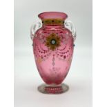 AN ANTIQUE VENETIAN CRANBERRY GLASS DECORATIVE VASE (SMALL CHIP ON BASE). 11cms 154gms