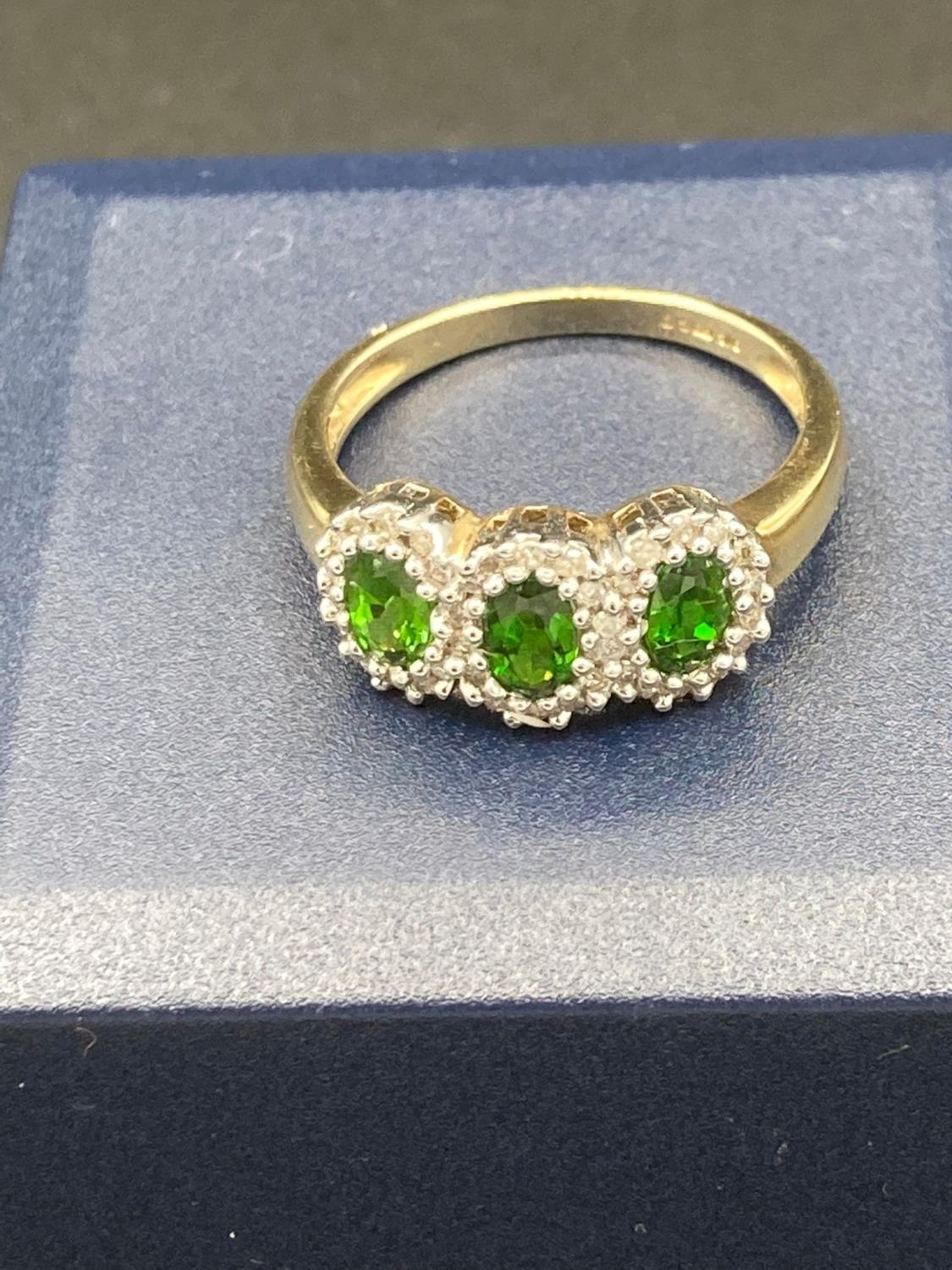 9 Carat Gold trilogy ring set with Green TOURMALINE and DIAMONDS. 2.3 grams . Size M.