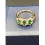 9 Carat Gold trilogy ring set with Green TOURMALINE and DIAMONDS. 2.3 grams . Size M.