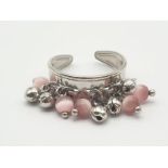 A Silver Ring with Small Pink Ball Charms. Size P (expandable). 3.94g