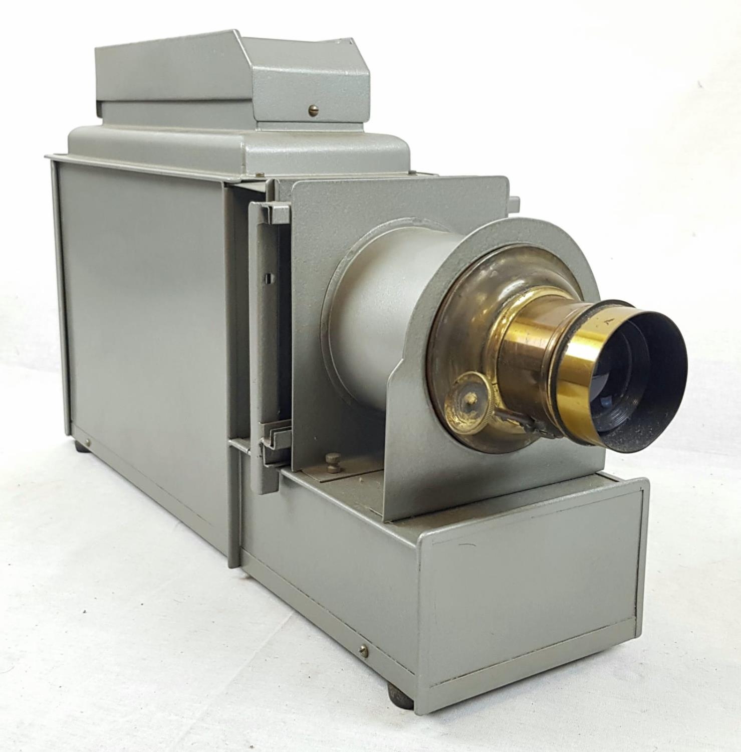 A Vintage Slide Projector. Adjustable Brass-Cased Lens. As Found. 55 x 33cm.