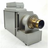 A Vintage Slide Projector. Adjustable Brass-Cased Lens. As Found. 55 x 33cm.