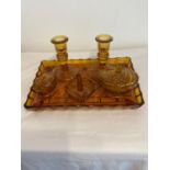 Vintage art deco Amber glass dressing table set ,to include pair of candle sticks,powder jar,trinket