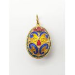 A Silver Gilded Enamel Egg-Shaped Pendant. 8.2g