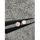 9k yellow gold stud earrings with round brilliant diamonds F-G/VS total around 0.30cts; 0.70g