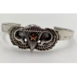 Solid Silver WW2 US Paratroopers Wings with combat star on a solid silver adjustable wrist band.