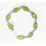 Crayola 20 Carats of Peridot and White Sapphire Silver Bracelet. 16cm