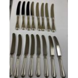 Collection of 16 Elizabeth II silver knives. (8 table knives and 8 cheese knives). Sterling silver