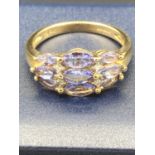 Ladies 9 carat GOLD and TANZANITE cluster ring. 2.4 grams .Size M-M1/2.