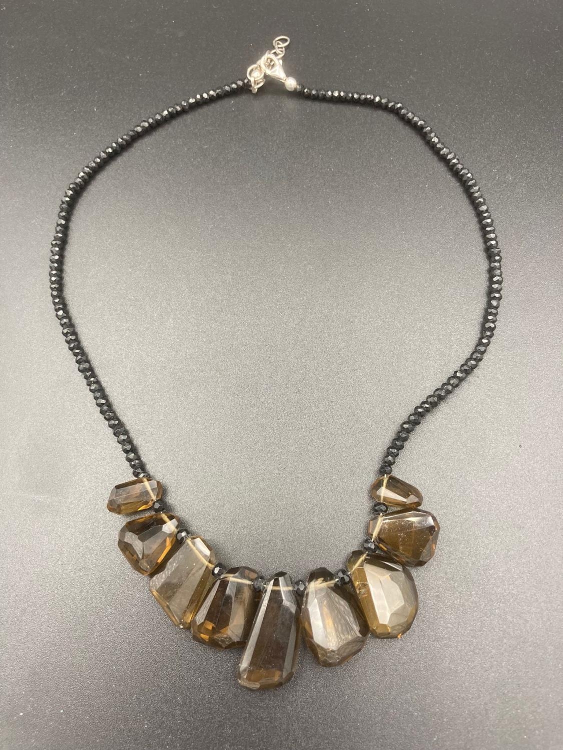 Vintage necklace silver mounted with jet and smoky quartz stones. Adjustable 44 to 48 cm. a/f.
