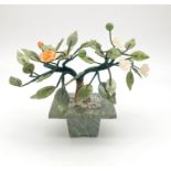 A CHINESE JADE GARDEN IN JADE FLOWER POT. 299gms 7.7 x 6.5cms pot